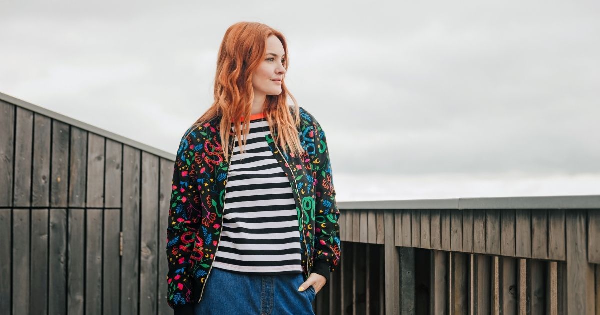 Sugarhill Brighton model wearing Yvette Cardigan multi, climbing tigers