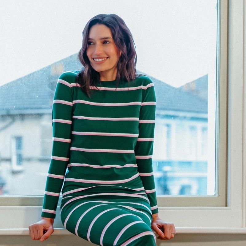 model wearing green stripey top 