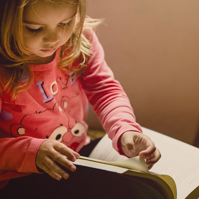 child with a book