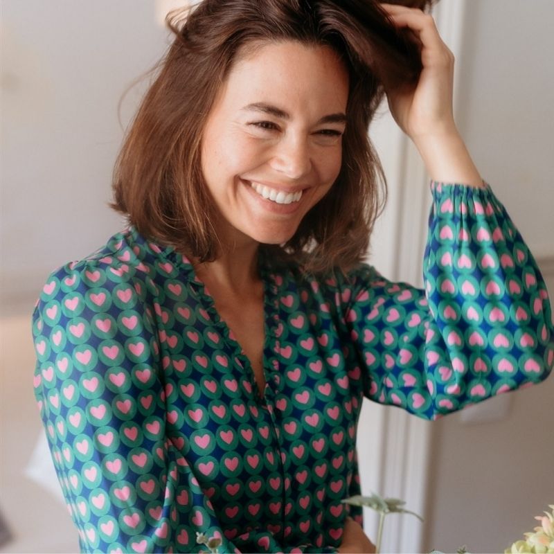 a close up of a heart print dress