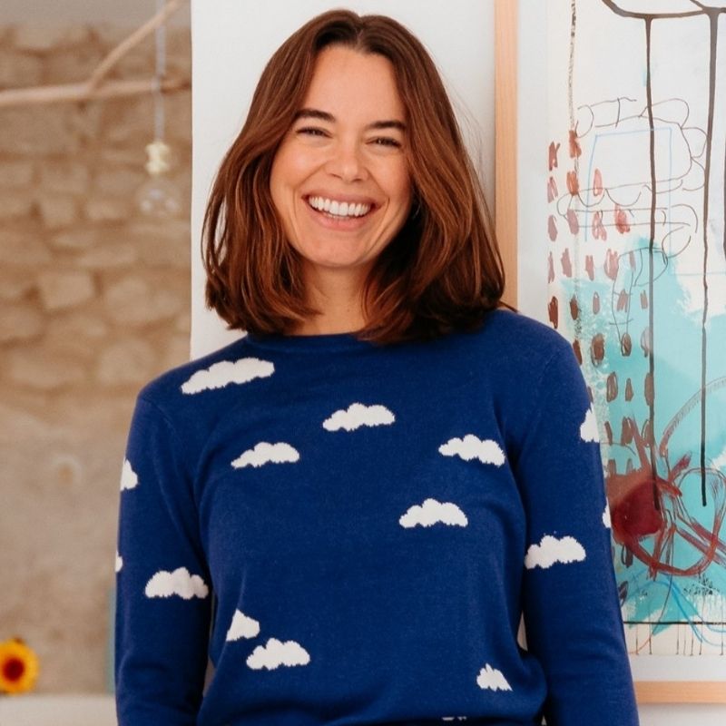woman modelling a cloud print jumper 