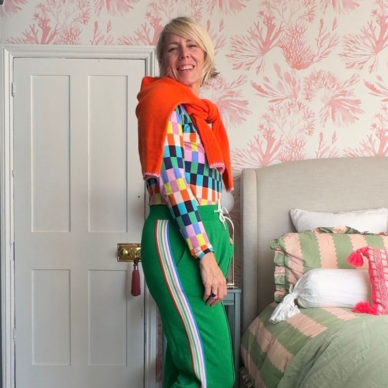 a woman in a colourful outfit