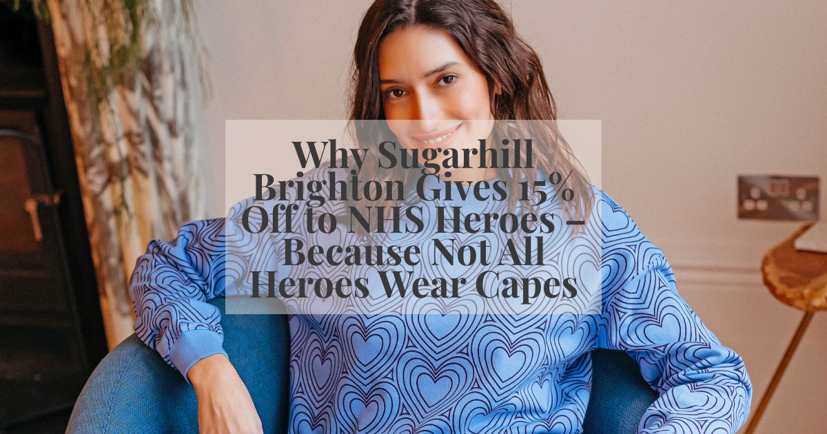 a woman wearing a blue sweatshirt with hearts on 