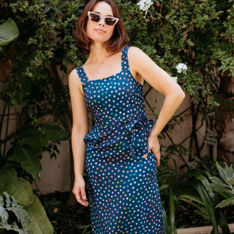 A woman modelling a jumper on the beach 