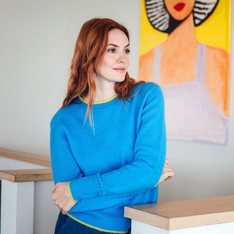 Sugarhill Brighton model wearing weating blue jumper
