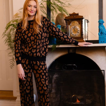 A woman wearng a leopar print coord