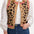 Sugarhill Brighton model wearing a leopard print cardigan with pink accents, white blouse, and blue jeans on a white background