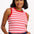 A woman wearing a sleeveless fitted pink vest with red stripes, round neckline, and contrast bands around the arm holes.