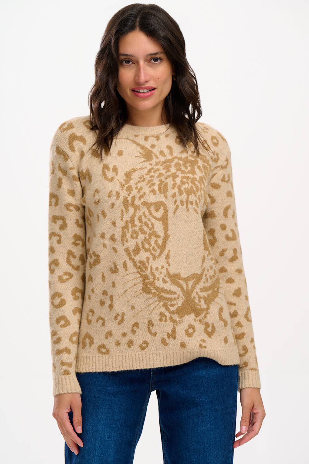 model wearing jumper with large leopard face on it 