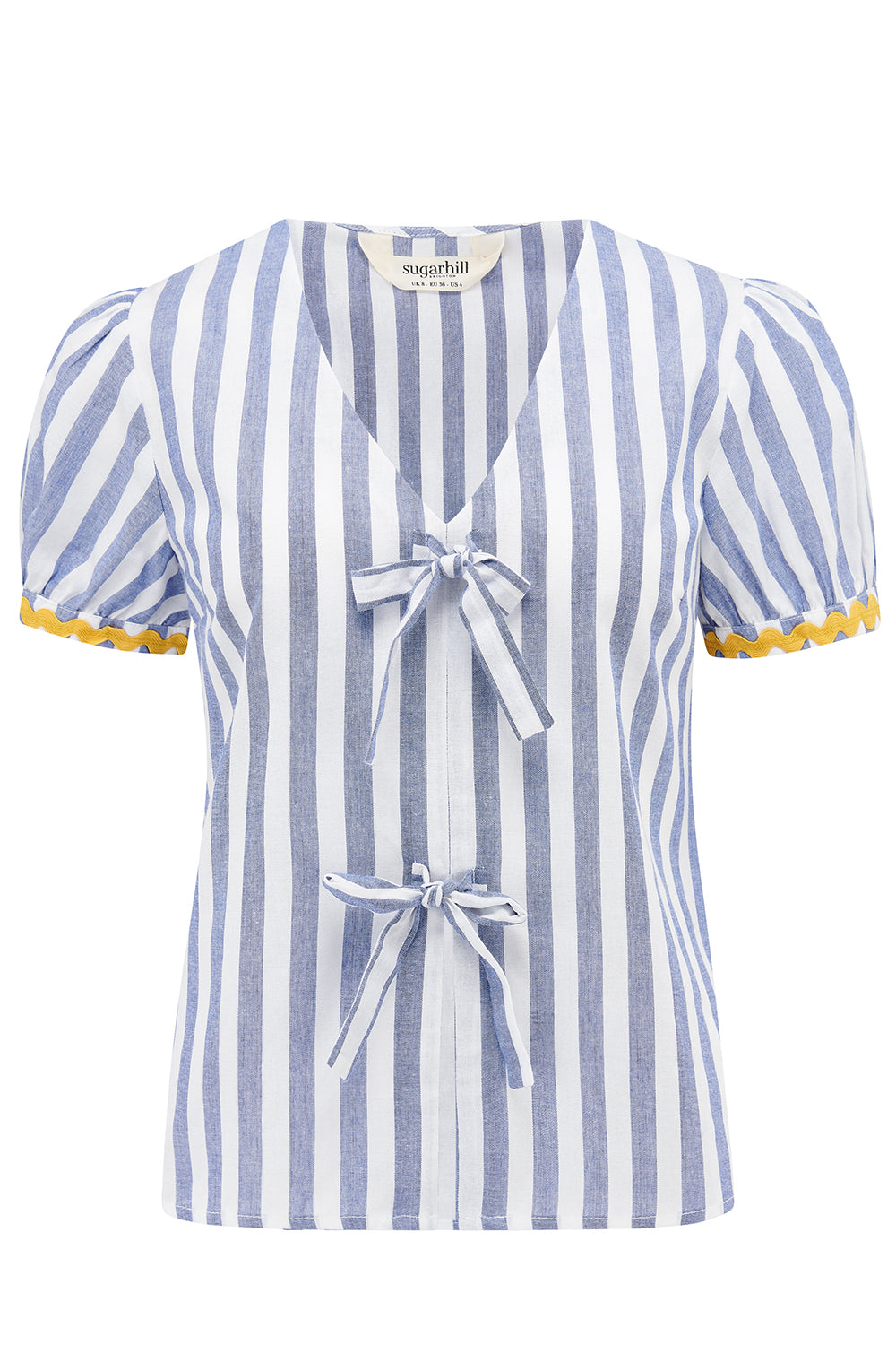 An off-white and blue striped top with short puff sleeves and a decorative bow tie at the v-neck.