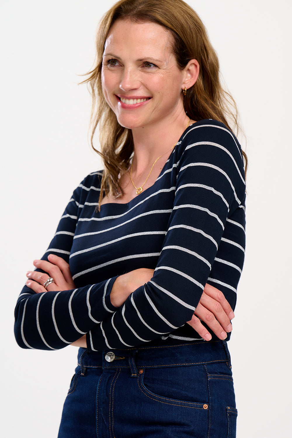 model wearing black top with silver stripes 