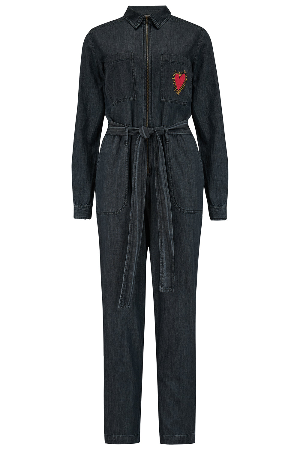 A washed black denim boilersuit with an exposed front zip and embroidered heart on the chest pocket