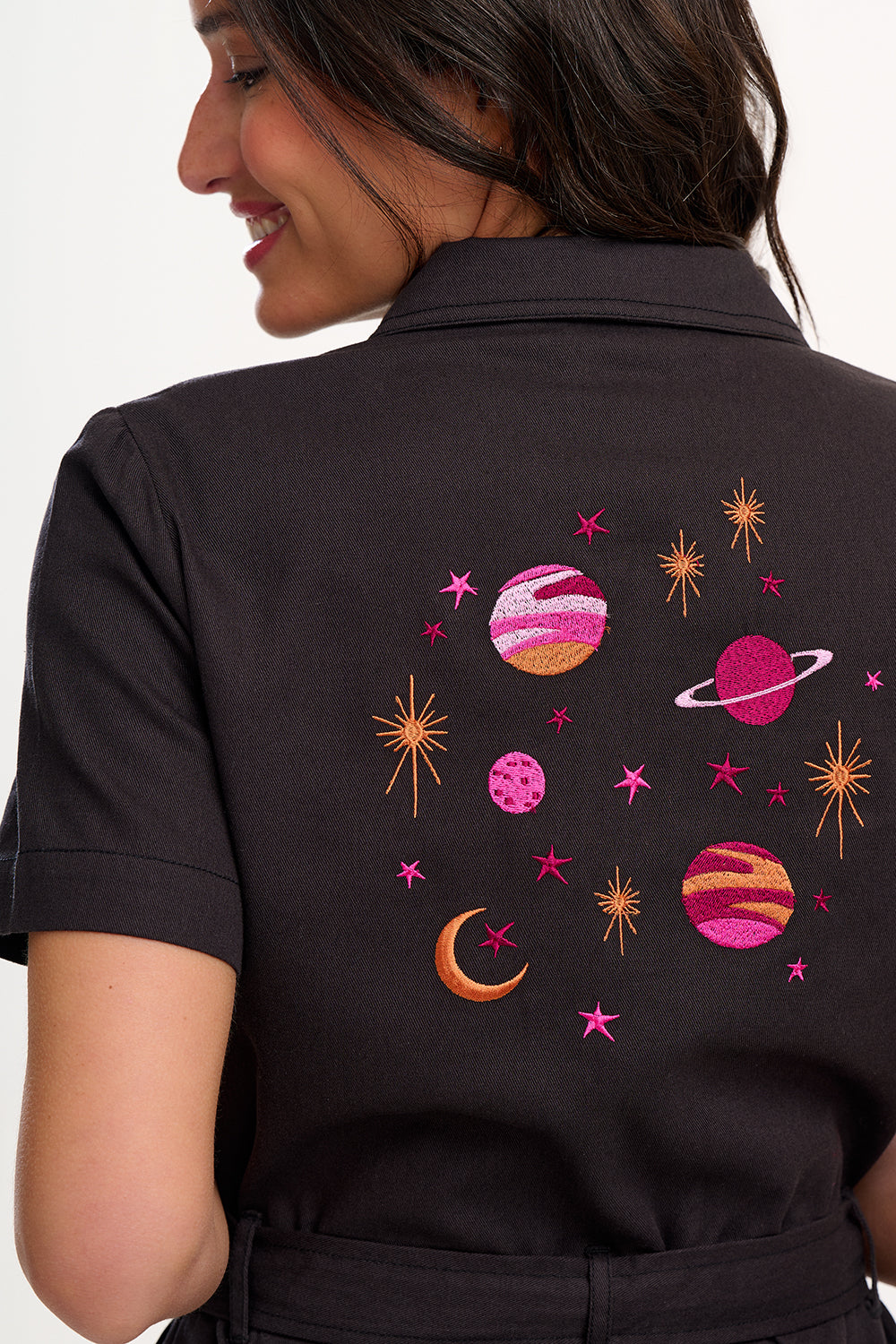Black shirt with space-themed embroidery on the back