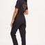A black boilersuit with half-sleeve shirt top and straight legs, featuring a floral and tiger embroidery on the back.