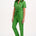 A model wearing a green boilersuit with rainbow flower embroidery on the chest pocket, featuring a half sleeve shirt upper, straight legs, and an exposed front zip.