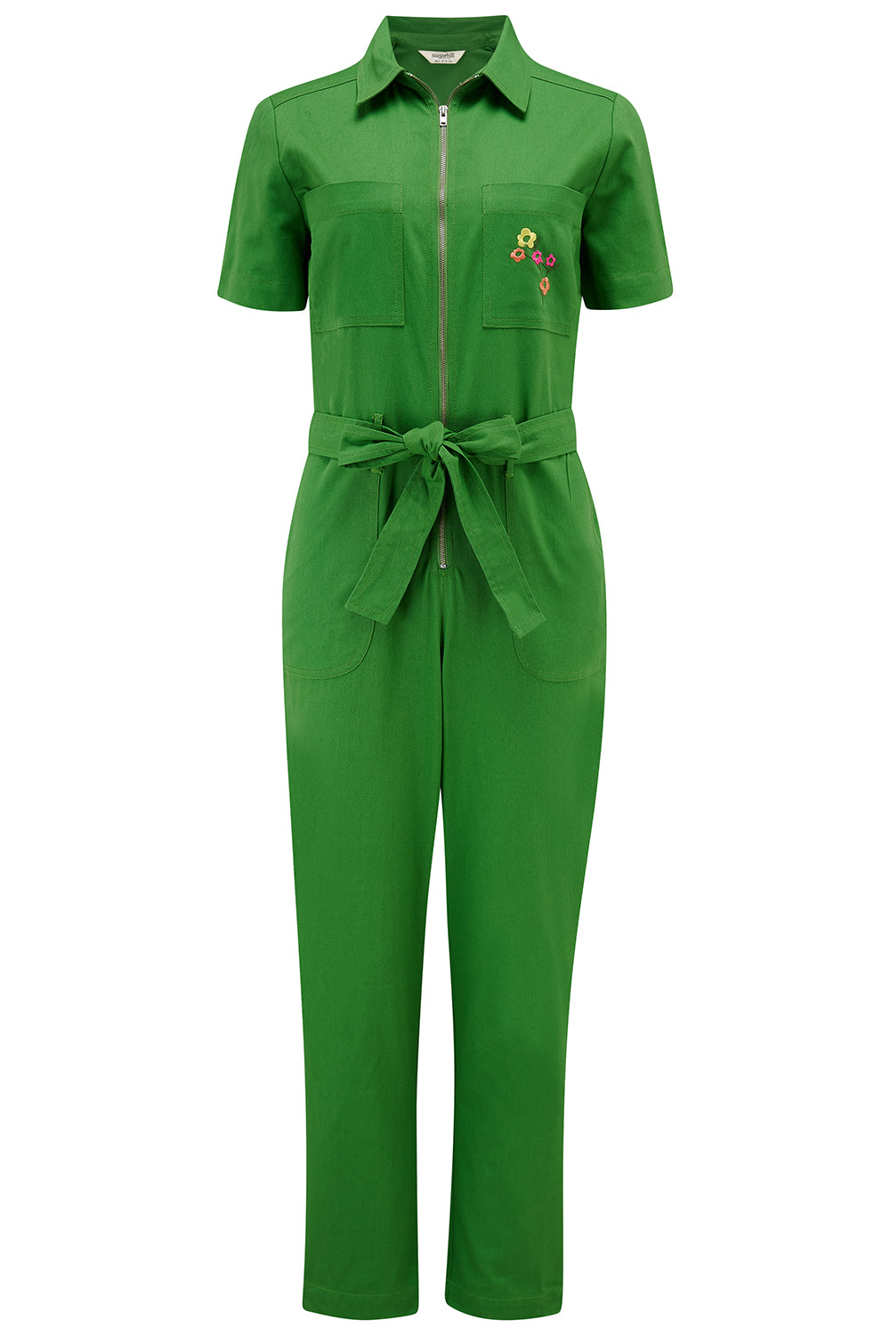 A green boilersuit with rainbow flower embroidery on the chest pocket, featuring a half sleeve shirt upper, straight legs, and an exposed front zip.