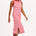 A model wearing a sleeveless, striped midi jersey dress in pink and red.