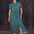 A model wearing a midi shirt dress with a green base and concentric circle pattern in blue, pink, and red. The dress features a neat collar, a button front, and puff short sleeves.