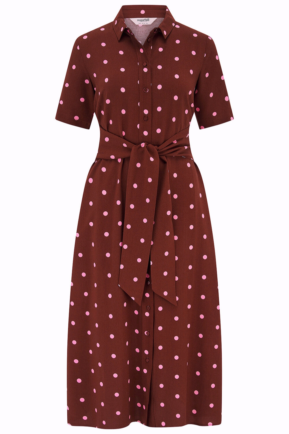 Brown dress with pink polka dots on a white background