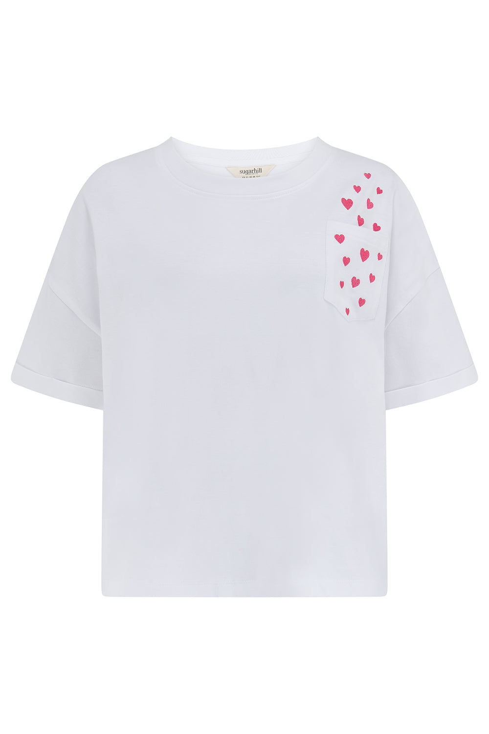 White t-shirt with red heart patterns on a white background