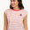 Woman wearing a red and white striped shirt with a colorful logo on a white background