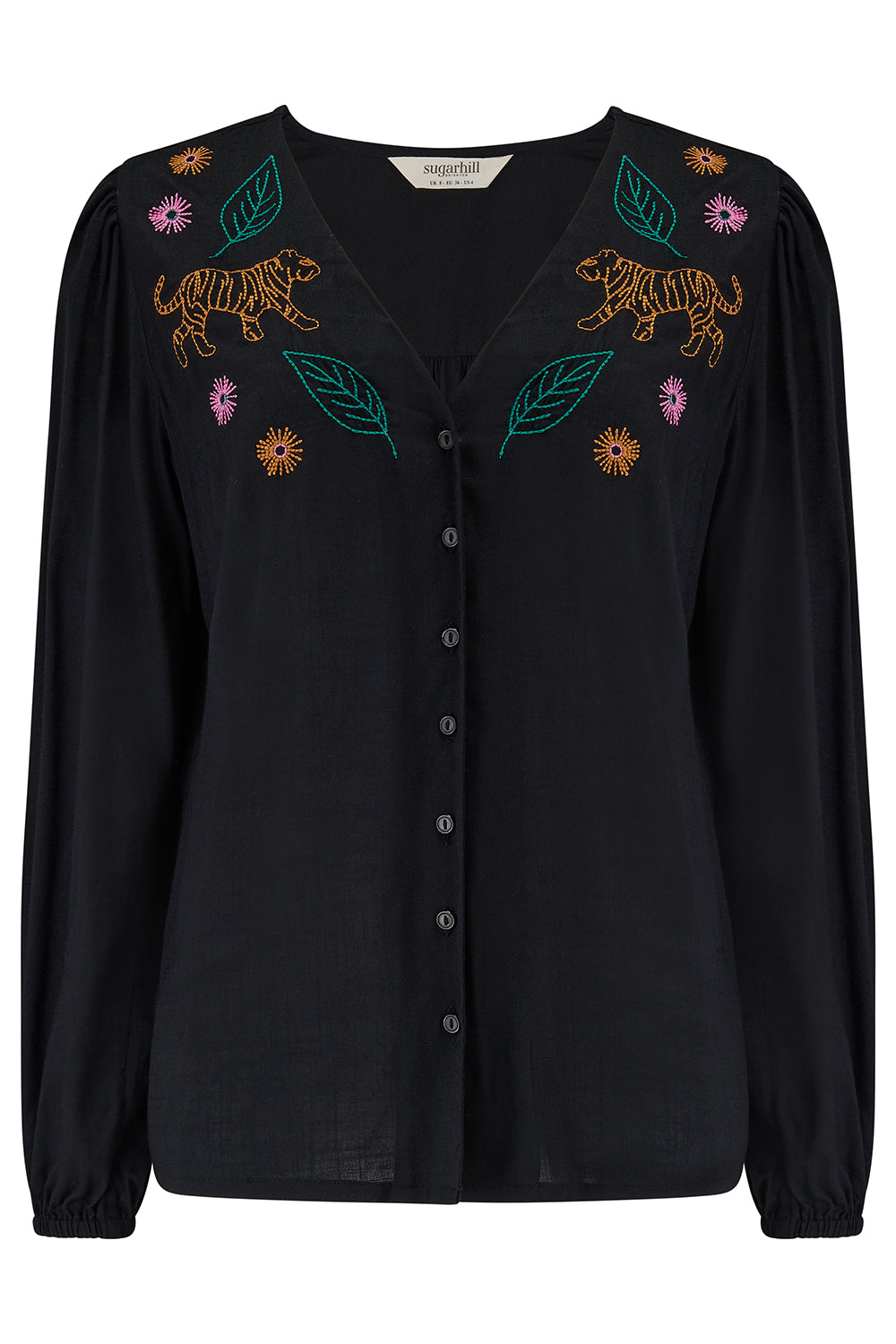 Black blouse with colorful embroidery on a white background