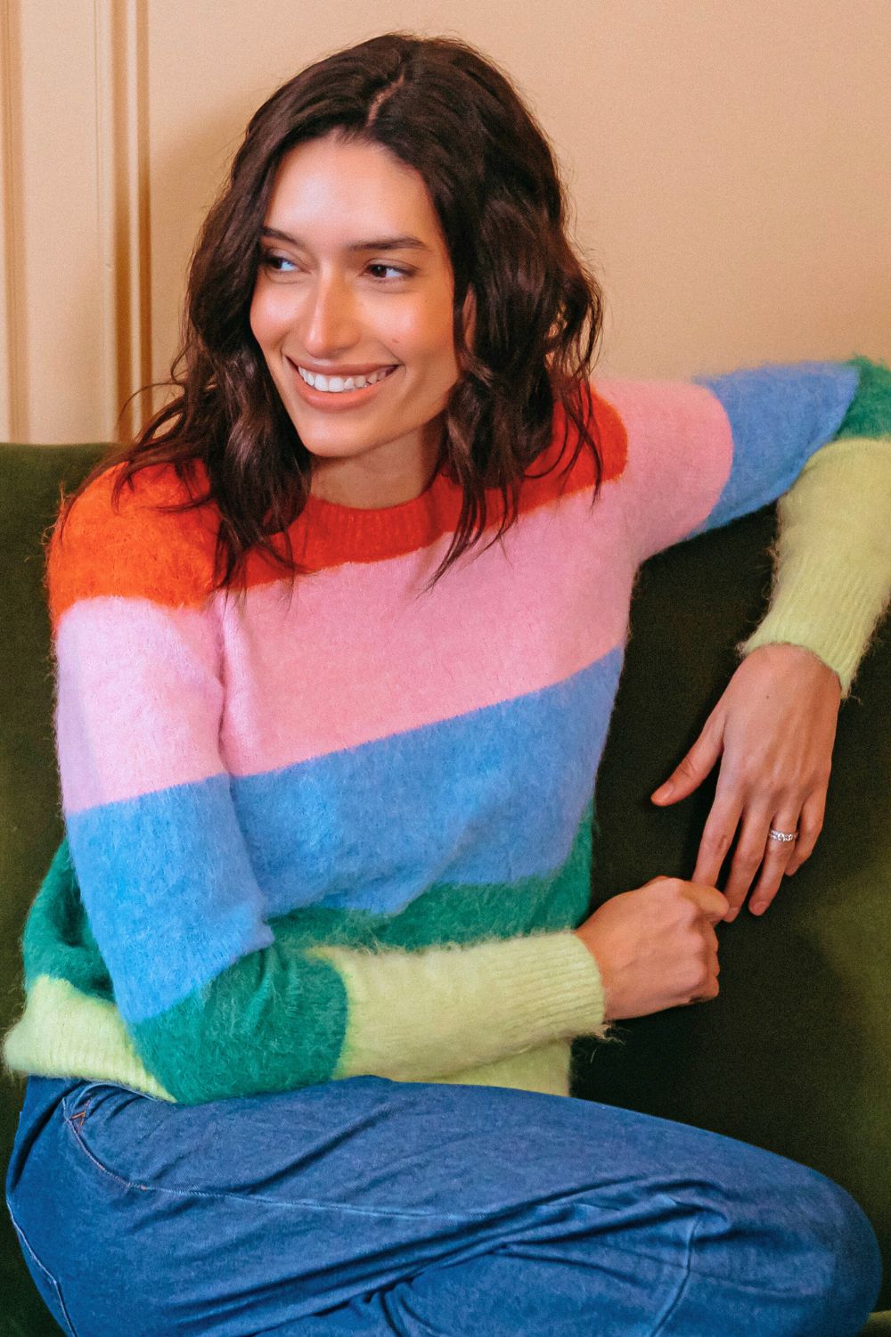 model wearing multicoloured striped fluffy jumper 