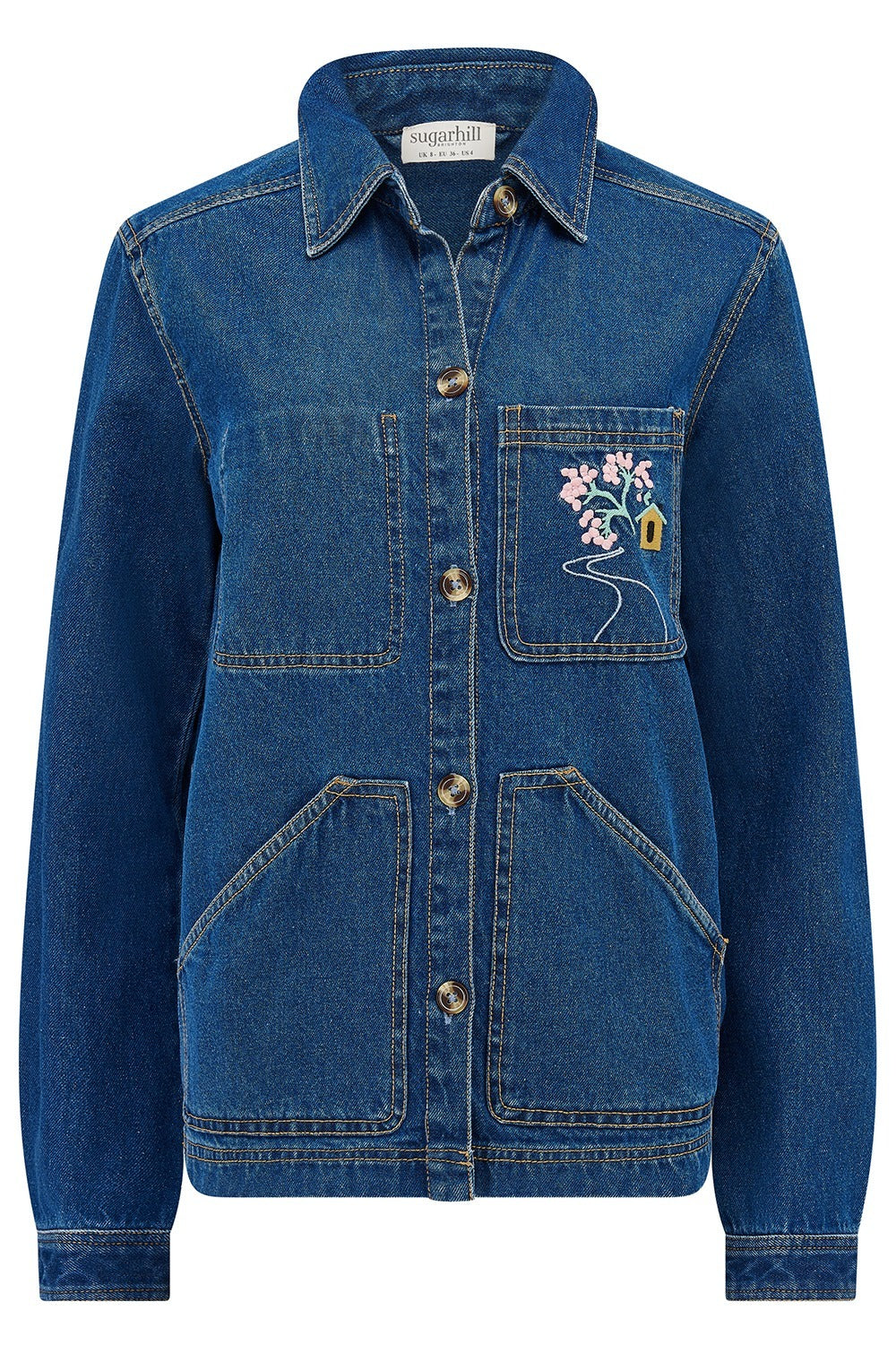 Blue denim jacket with floral embroidery on a white background