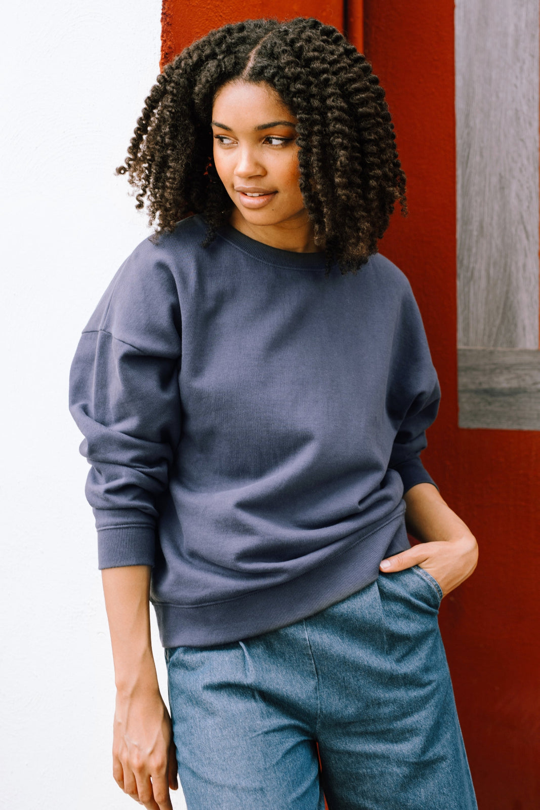 model wearing grey sweatshirt