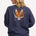 model wearing charcoal sweatshirt with large tiger motif