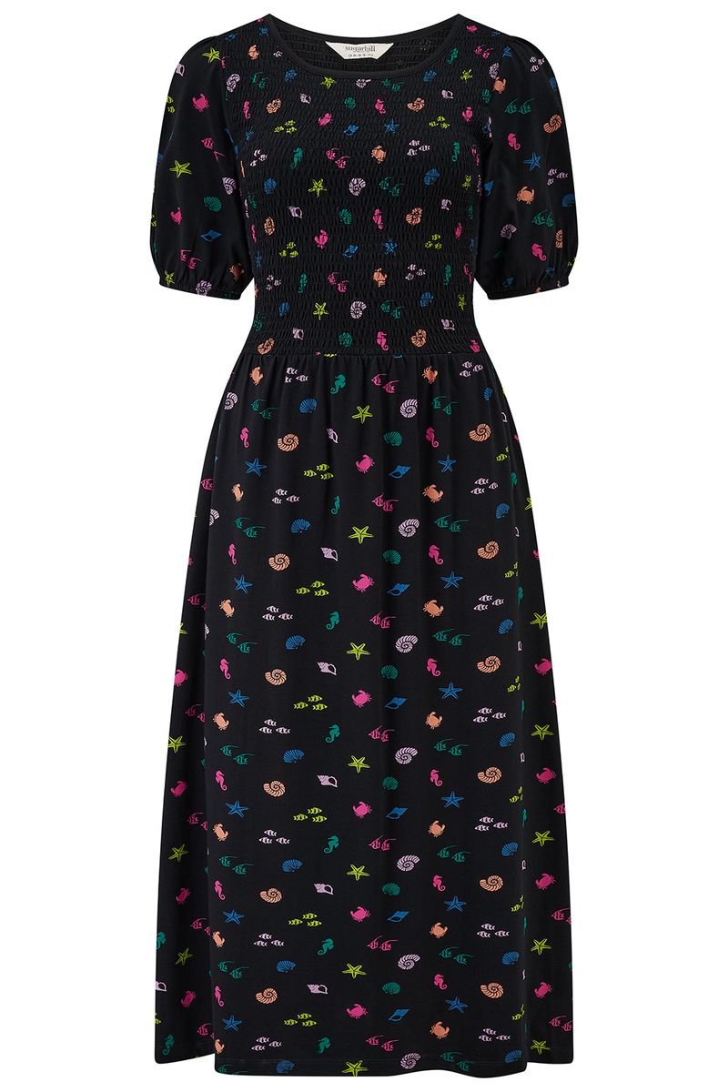 Black dress with colorful floral pattern on a white background