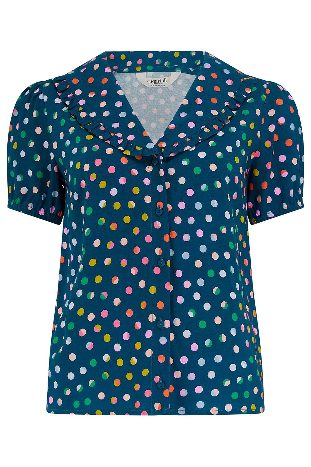 Navy blue blouse with multicolored polka dots on a white background