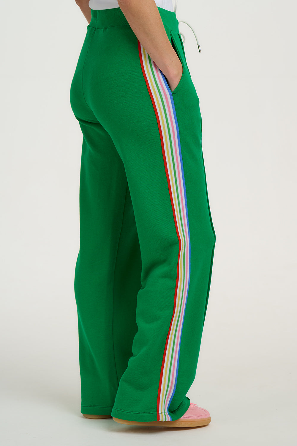 Green pants with colorful stripes on a white background
