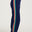 Woman wearing navy sweatpants with colorful stripes on a white background