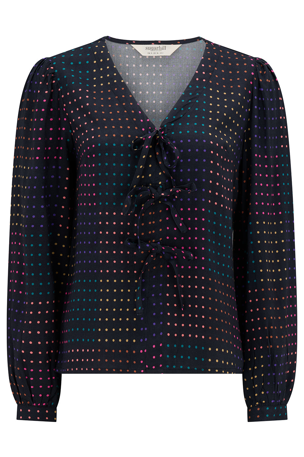 Patterned blouse with a V-neck on a white background