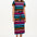 A model wearing a midi length, short sleeve, striped dress in black and multiple colors with a belt, standing against a white background.