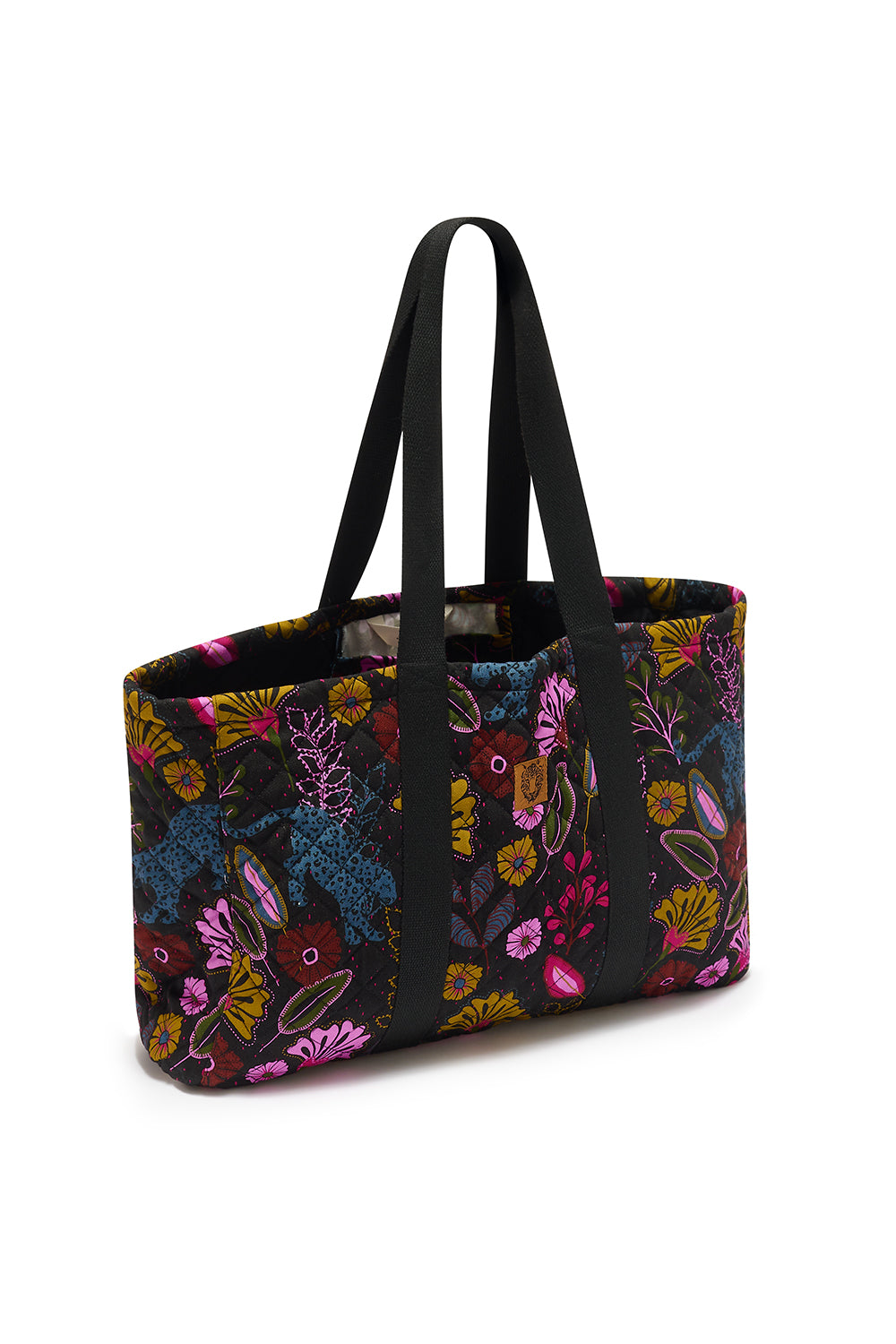Floral patterned tote bag with black handles on a white background