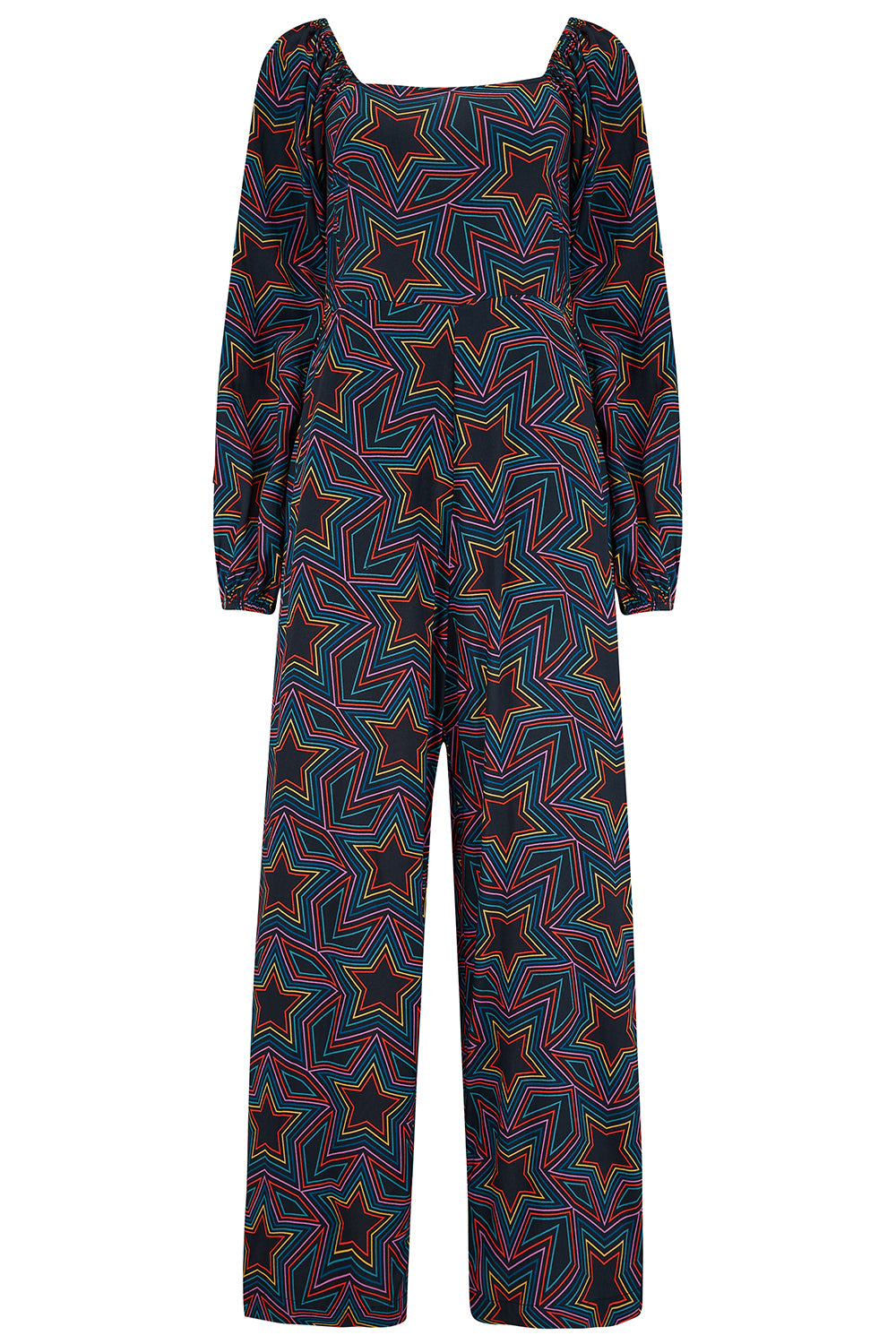 A black and rainbow star explosion patterned jumpsuit with a square neckline, long blouson sleeves, a fitted waist, and wide-leg trousers.