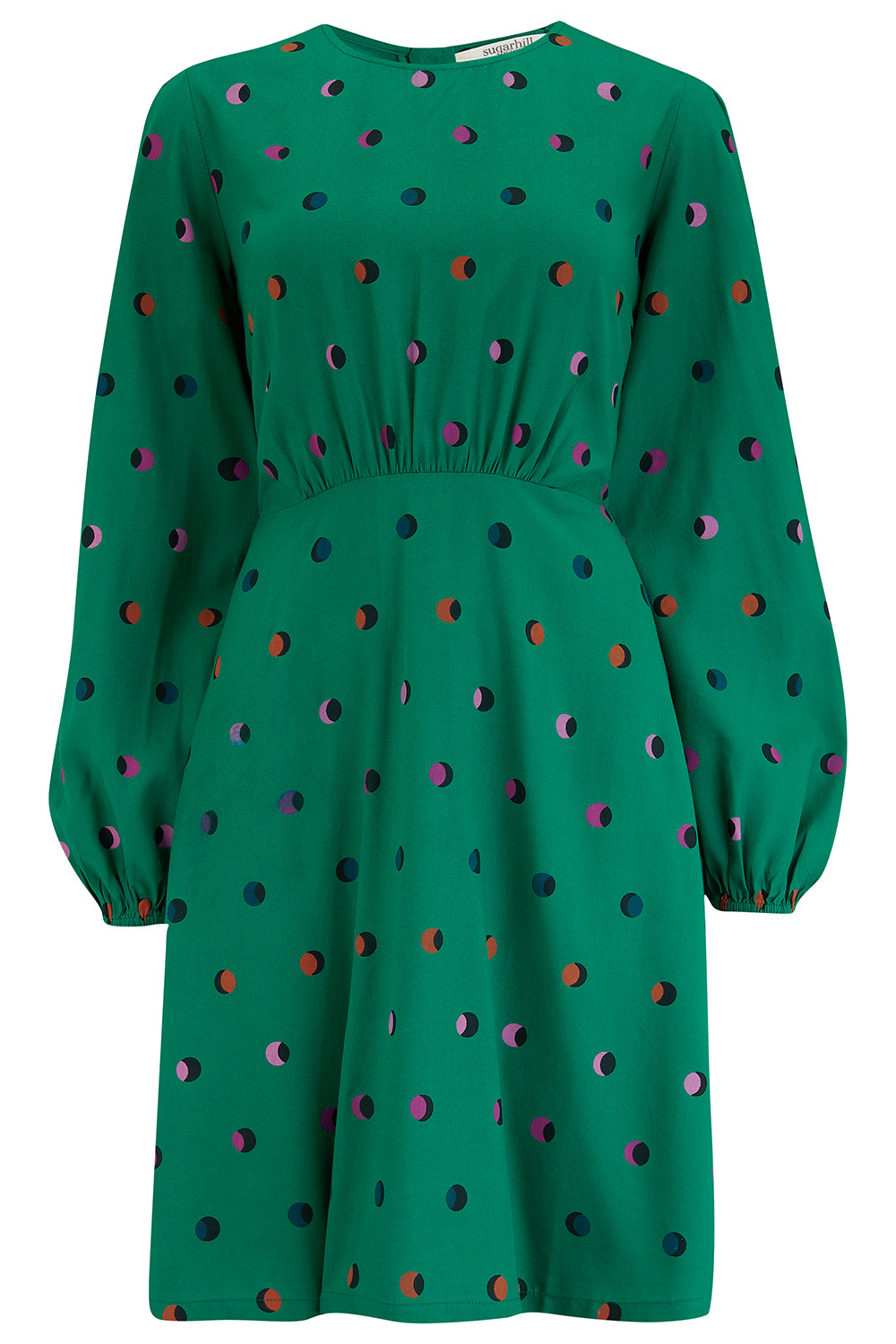 A green mini dress with a rainbow shadow polka print, featuring gathers at the shoulders, long blouson sleeves, a fitted waist, and a flared skirt.