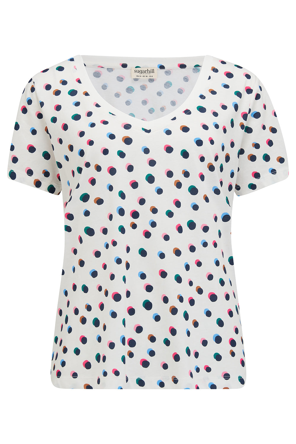 A V-neck T-shirt with a multicolor polka dot pattern, paired with blue jeans.