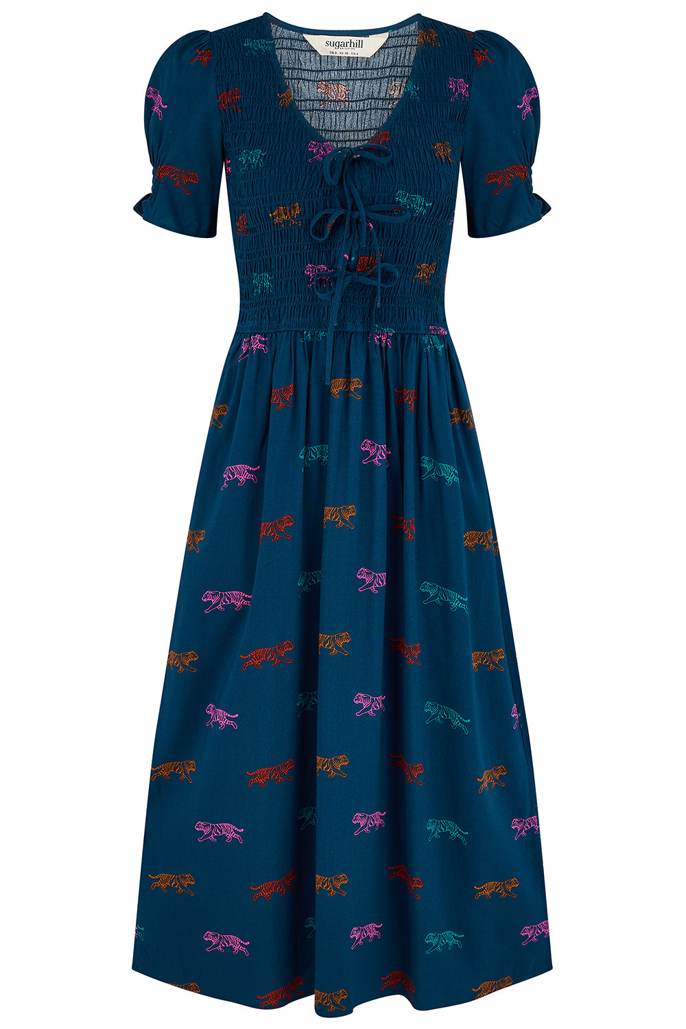A dark teal blue midi dress with a colorful dragonfly pattern, featuring short puff sleeves, a smocked bodice, and a tie-front neckline.