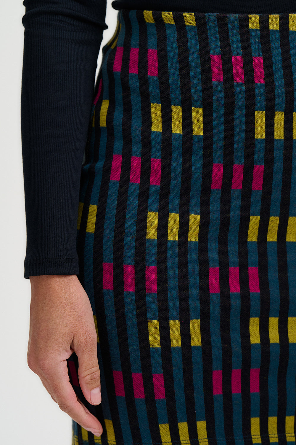 Patterned skirt with geometric design on a plain background