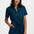 Woman wearing a blue leopard print romper on a white background