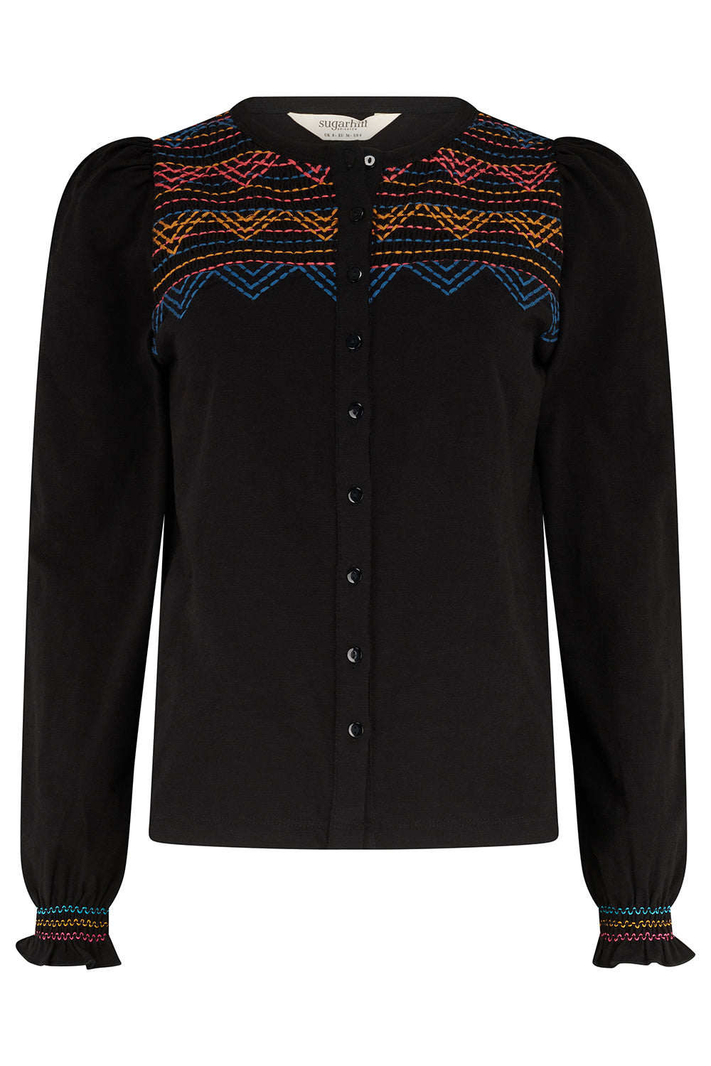 Black blouse with colorful embroidery on a white background