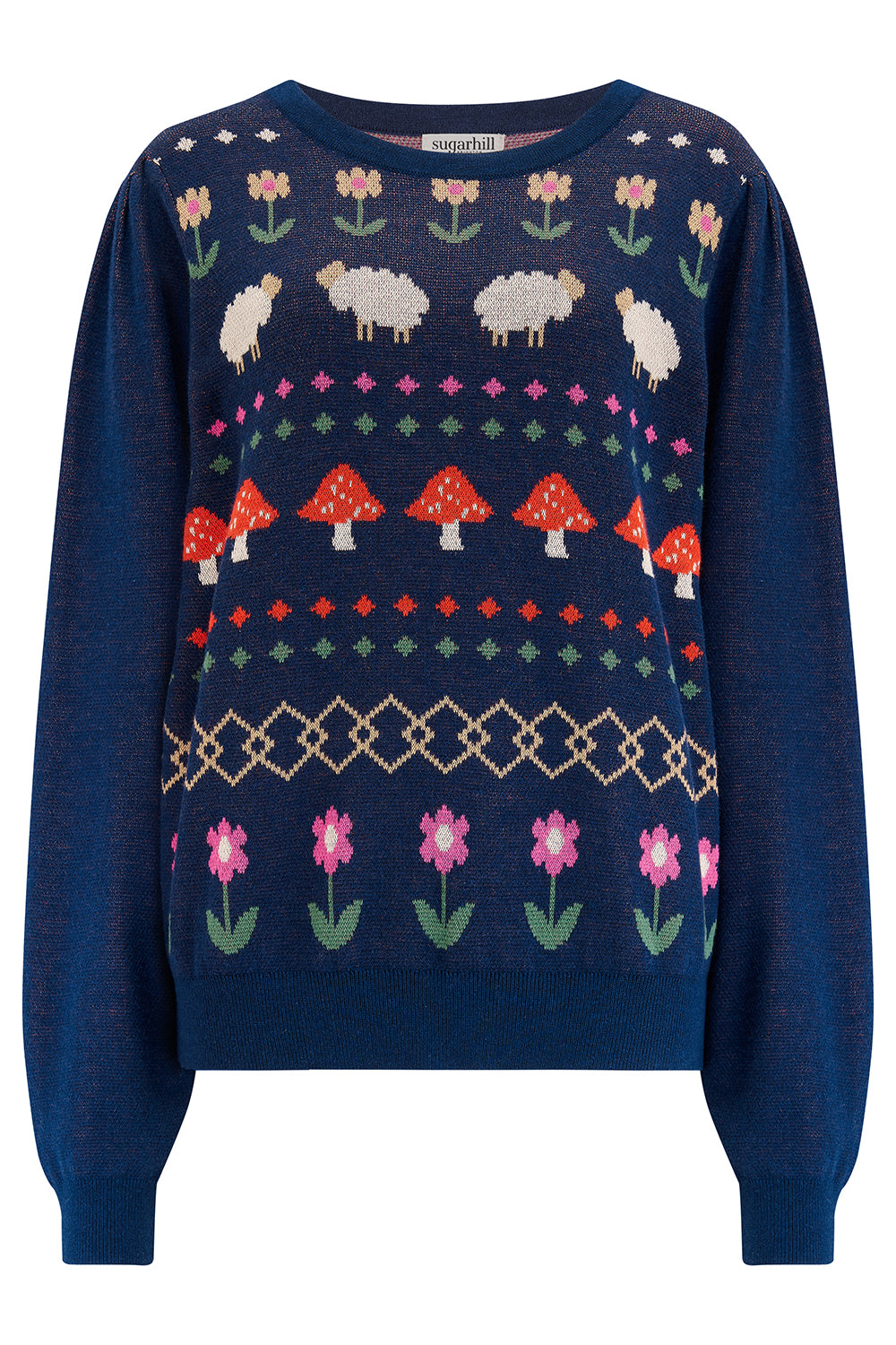 A navy blue jumper with a colorful fairisle pattern featuring sheep, toadstools, and flowers, paired with black jeans.