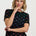 Bold black tshirt with colourful rainbows on 