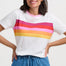 Person wearing a white t-shirt and blue jeans on a white background