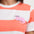 Close-up of a person wearing a striped shirt with a cat design on a white background
