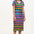 A model wearing a midi-length V-neck dress with stripes in green and other colors, featuring a matching tie belt.