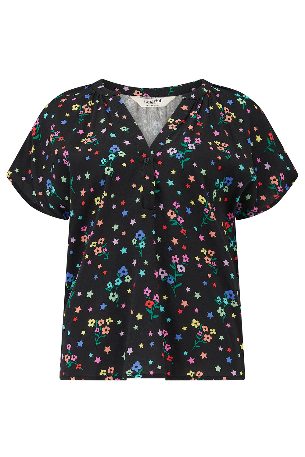 A black blouse with a colorful floral and star print, featuring a round grandad collar and short cap sleeves.